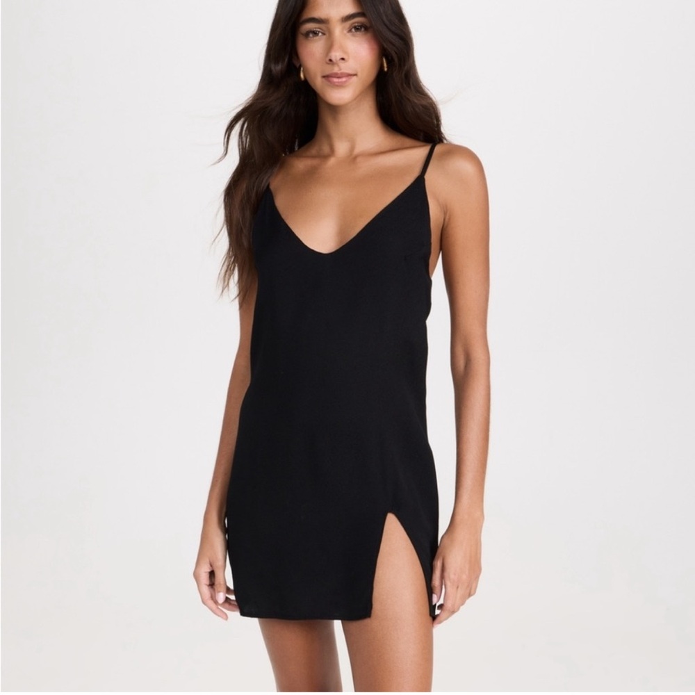 Reformation black mini dress with slit